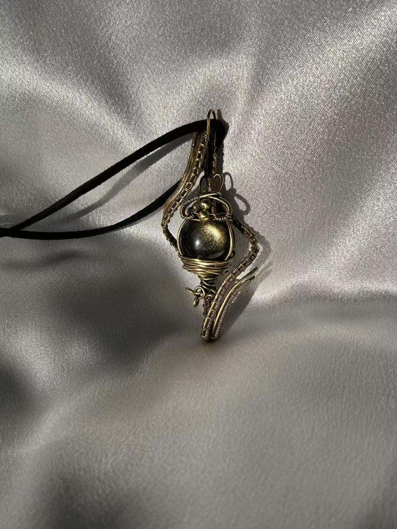 "TIME TRAVEL" GOLDIA NECKLACE